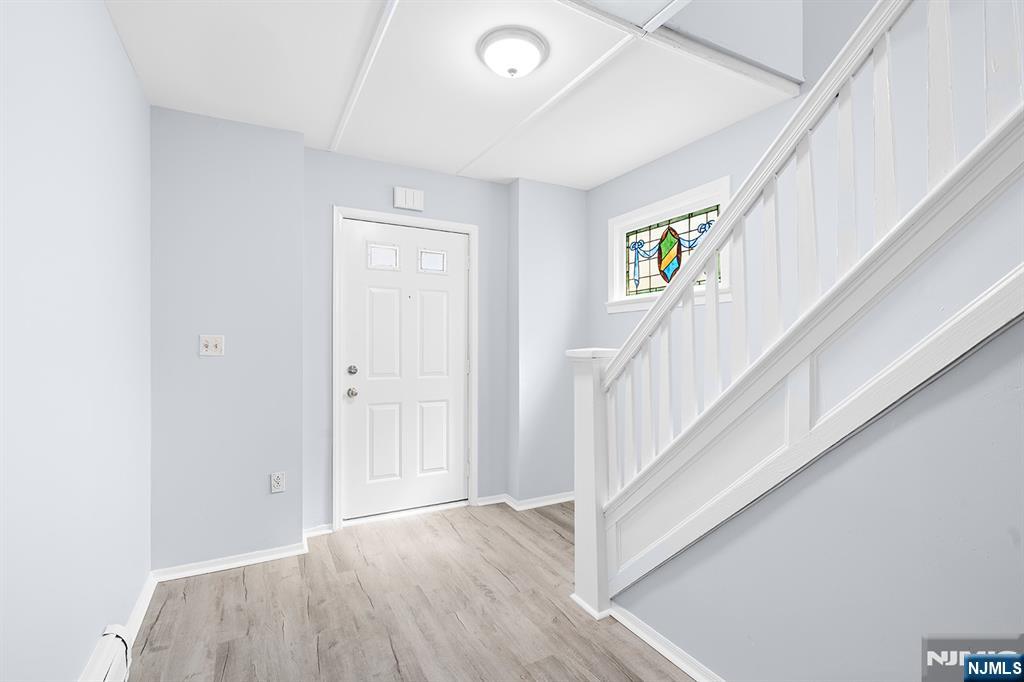 140 Park Avenue, Unit 2 Park Ridge, NJ 07656 - Photo 17 of 19 a view of an entryway with wooden floor