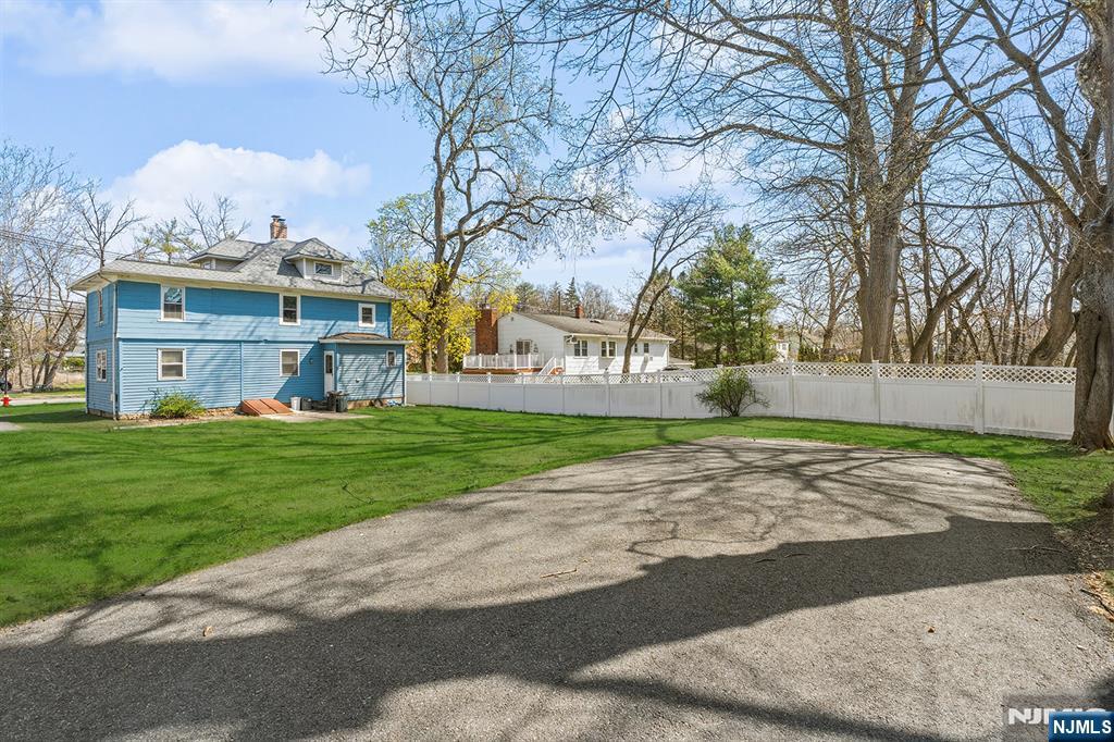 140 Park Avenue, Unit 2 Park Ridge, NJ 07656 - Photo 18 of 19 a view of a house with a yard
