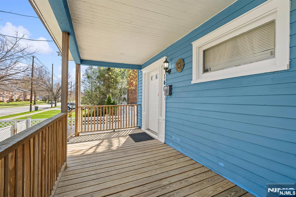 140 Park Avenue, Unit 2 Park Ridge, NJ 07656 - Photo 2 of 19 a view of a house with wooden deck