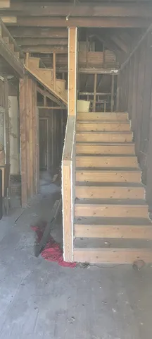 a view of a backyard of a house