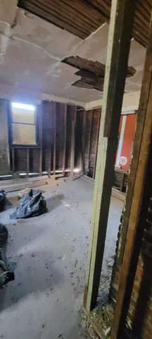 a view of garage with wooden floor