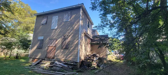 a room with lots of different colored cloths