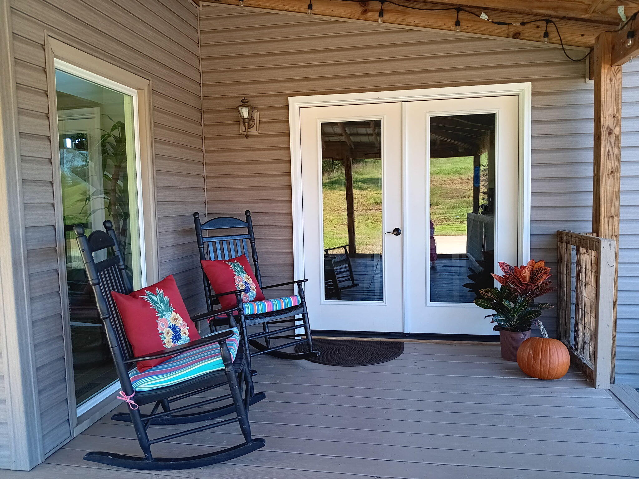 6000 Ferrum Mountain Road Callaway, VA 24067 - Photo 7 of 58 a view of backyard with seating space and wooden fence