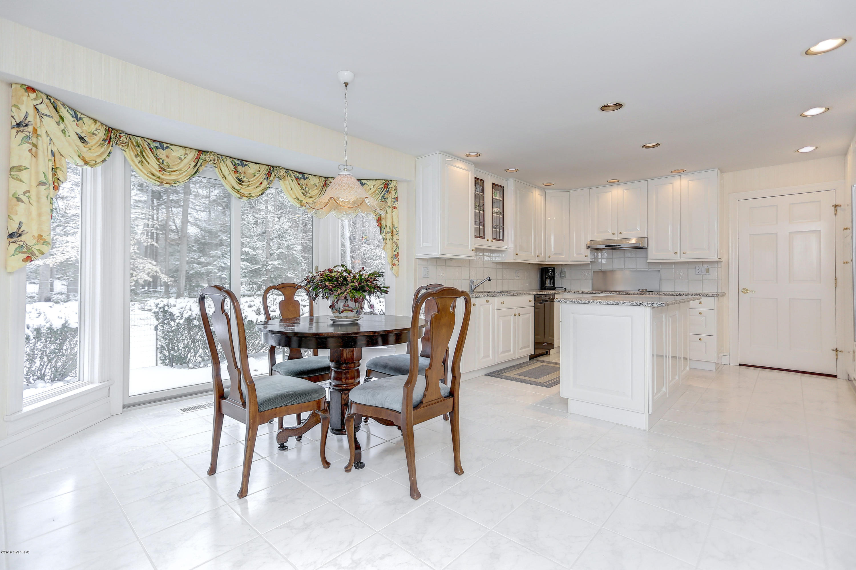 73 Taconic Road Greenwich, CT 06831 - Photo 9 of 24 a view of a dining room with furniture window and outside view