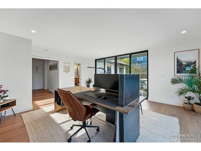 a bedroom with a bed and furniture