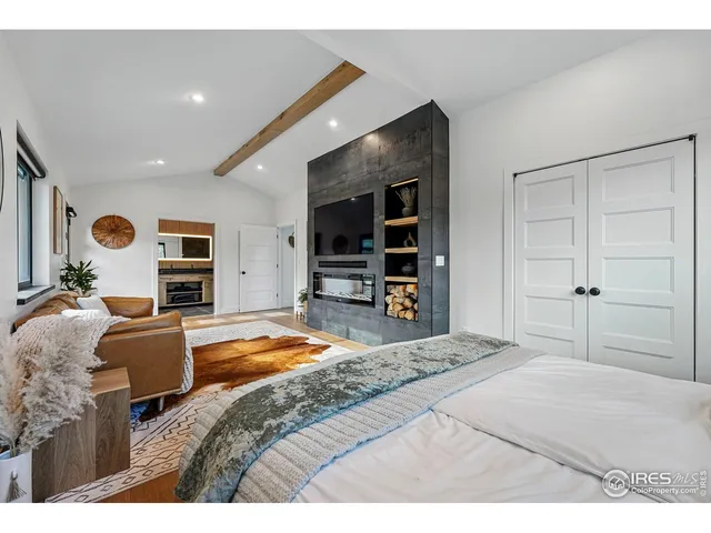 a kitchen with a refrigerator and a sink