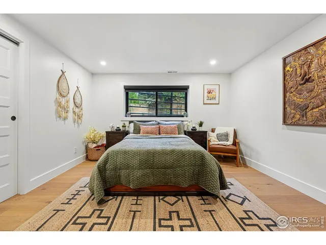 a bedroom with a bed and closet