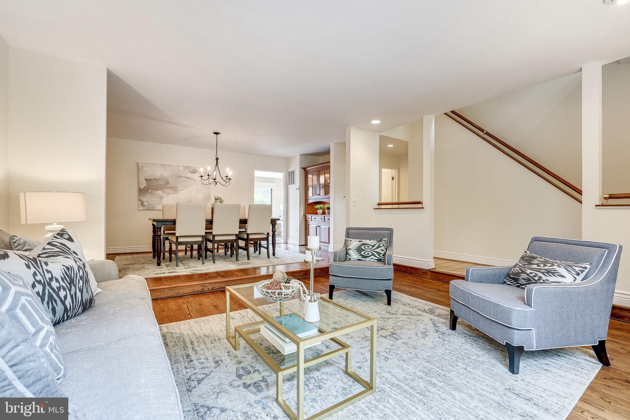 2024 Lakebreeze Way Reston, VA 20191 - Photo 11 of 95 a living room with furniture and a couch