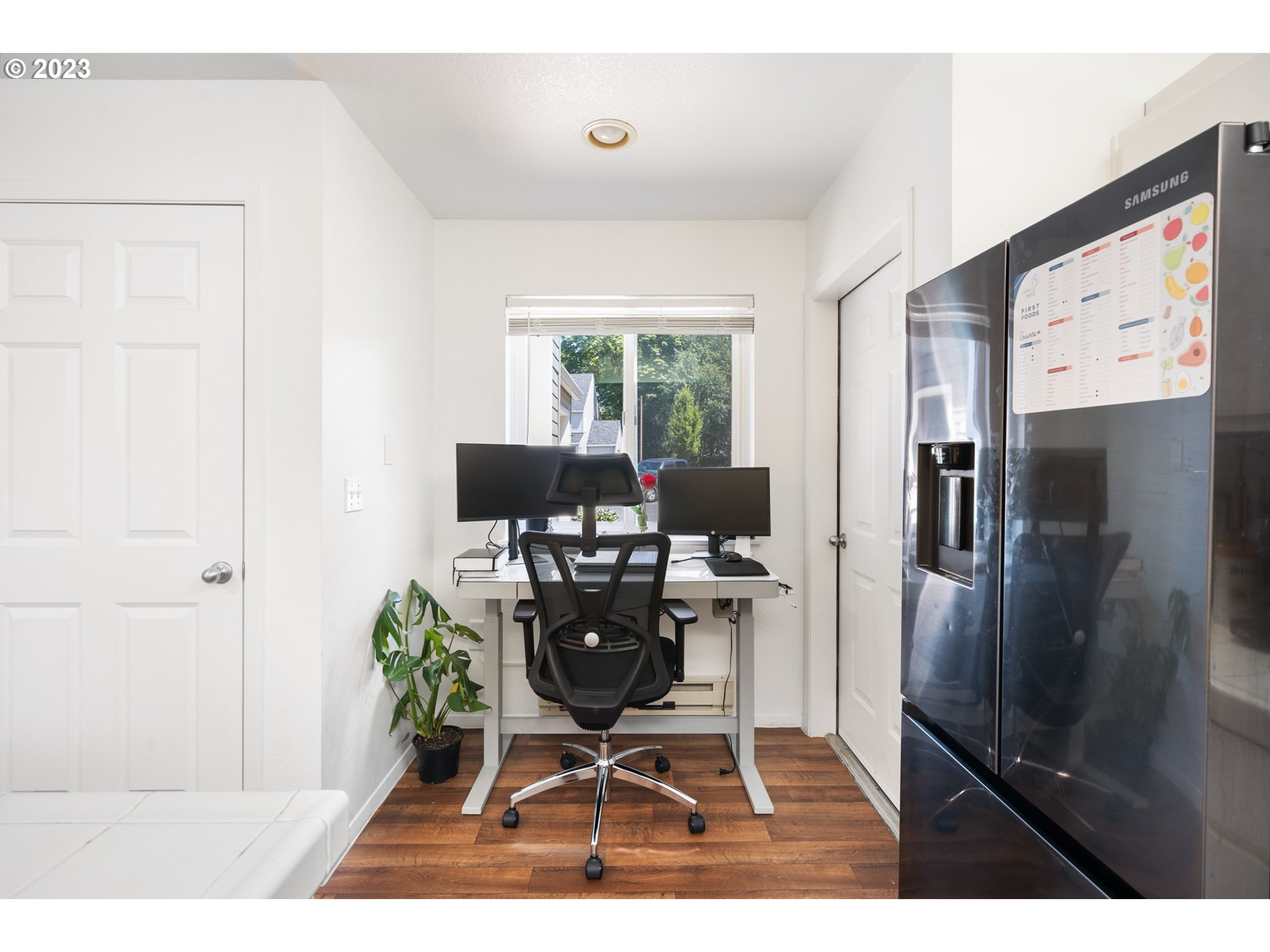 5225 Jean Road, Unit 309 Lake Oswego, OR 97035 - Photo 12 of 26 a work room with furniture and wooden floor