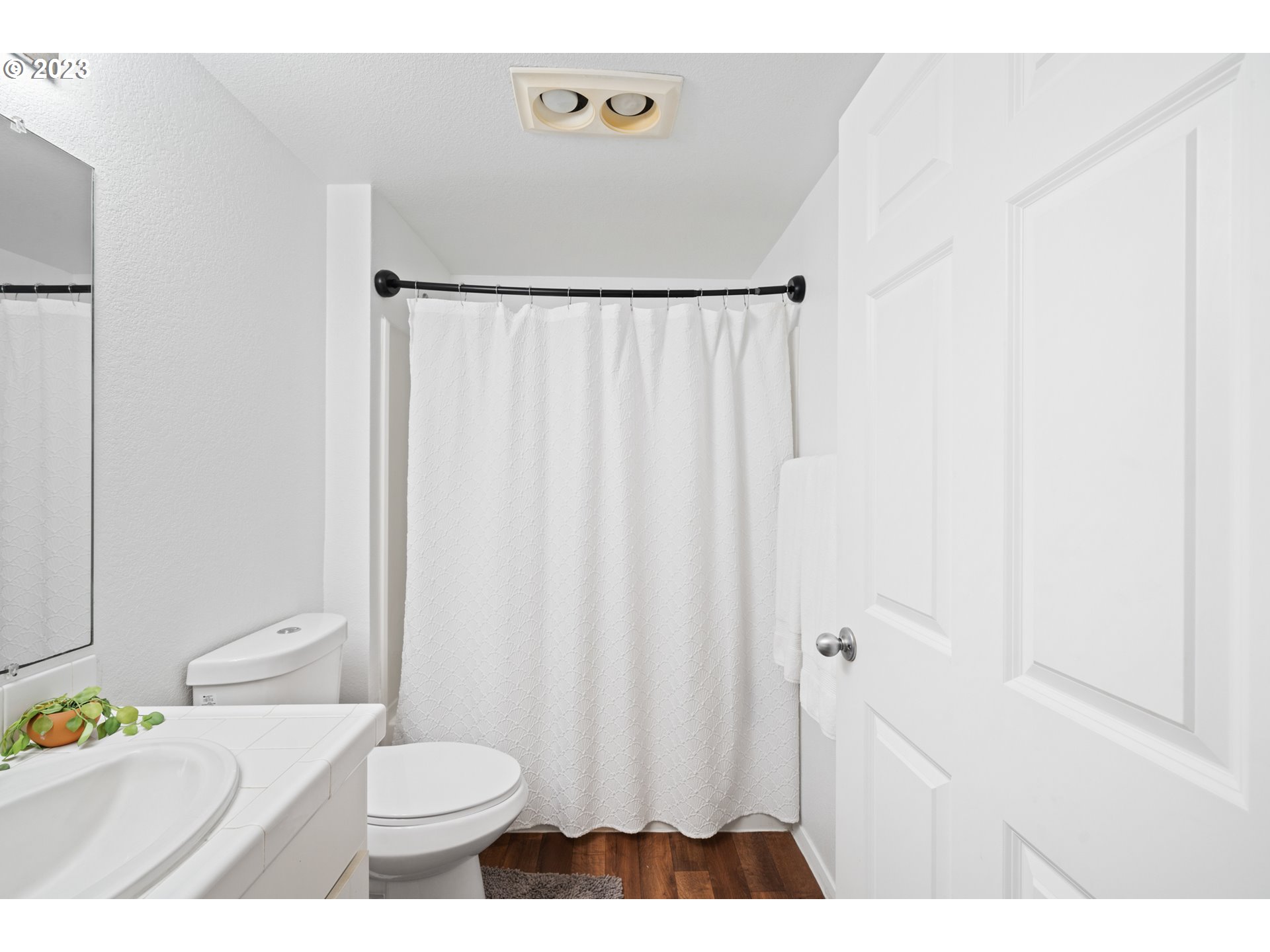 5225 Jean Road, Unit 309 Lake Oswego, OR 97035 - Photo 20 of 26 a bathroom with a sink toilet and shower