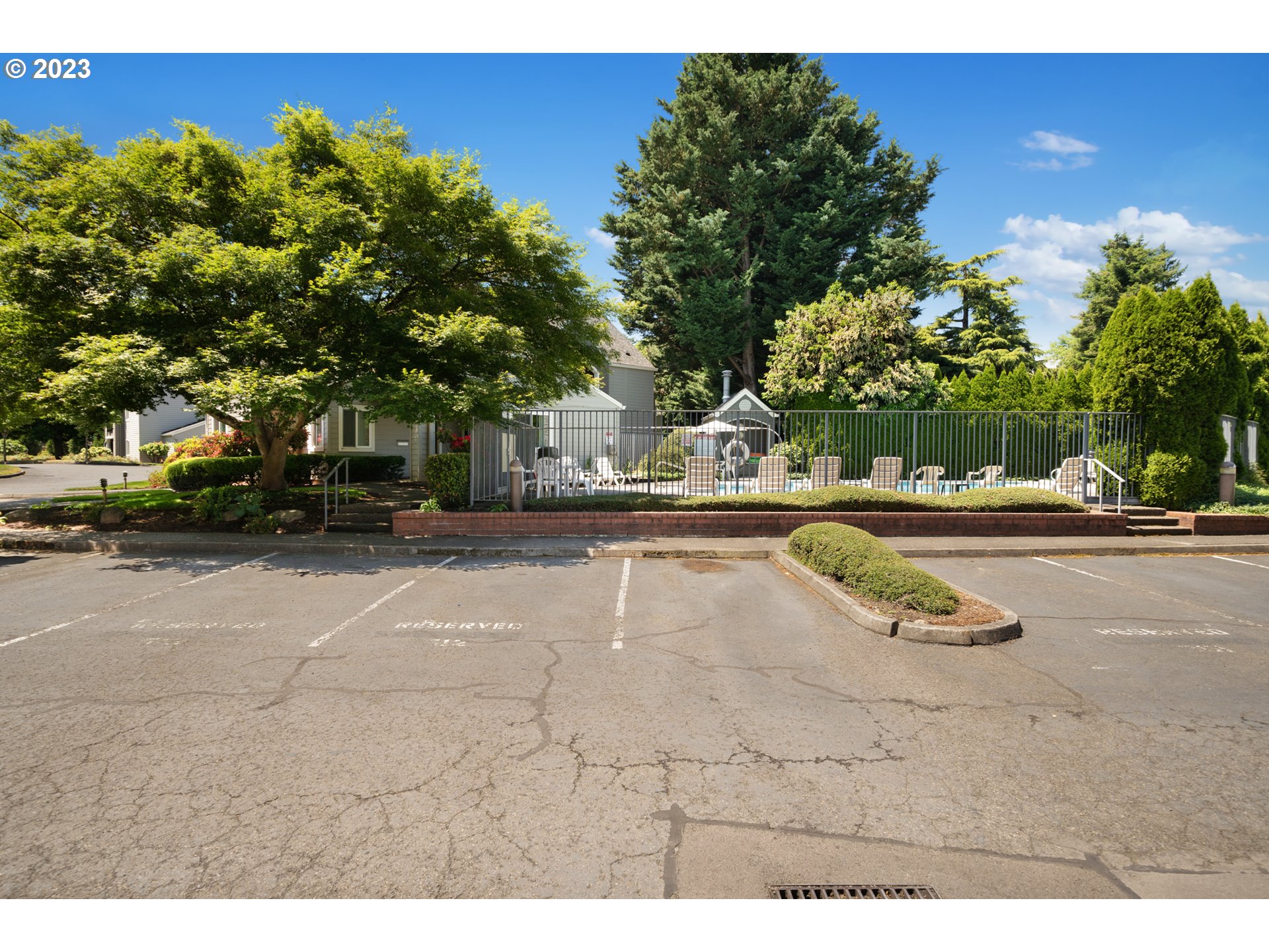 5225 Jean Road, Unit 309 Lake Oswego, OR 97035 - Photo 26 of 26 a view of a swimming pool with an outdoor seating