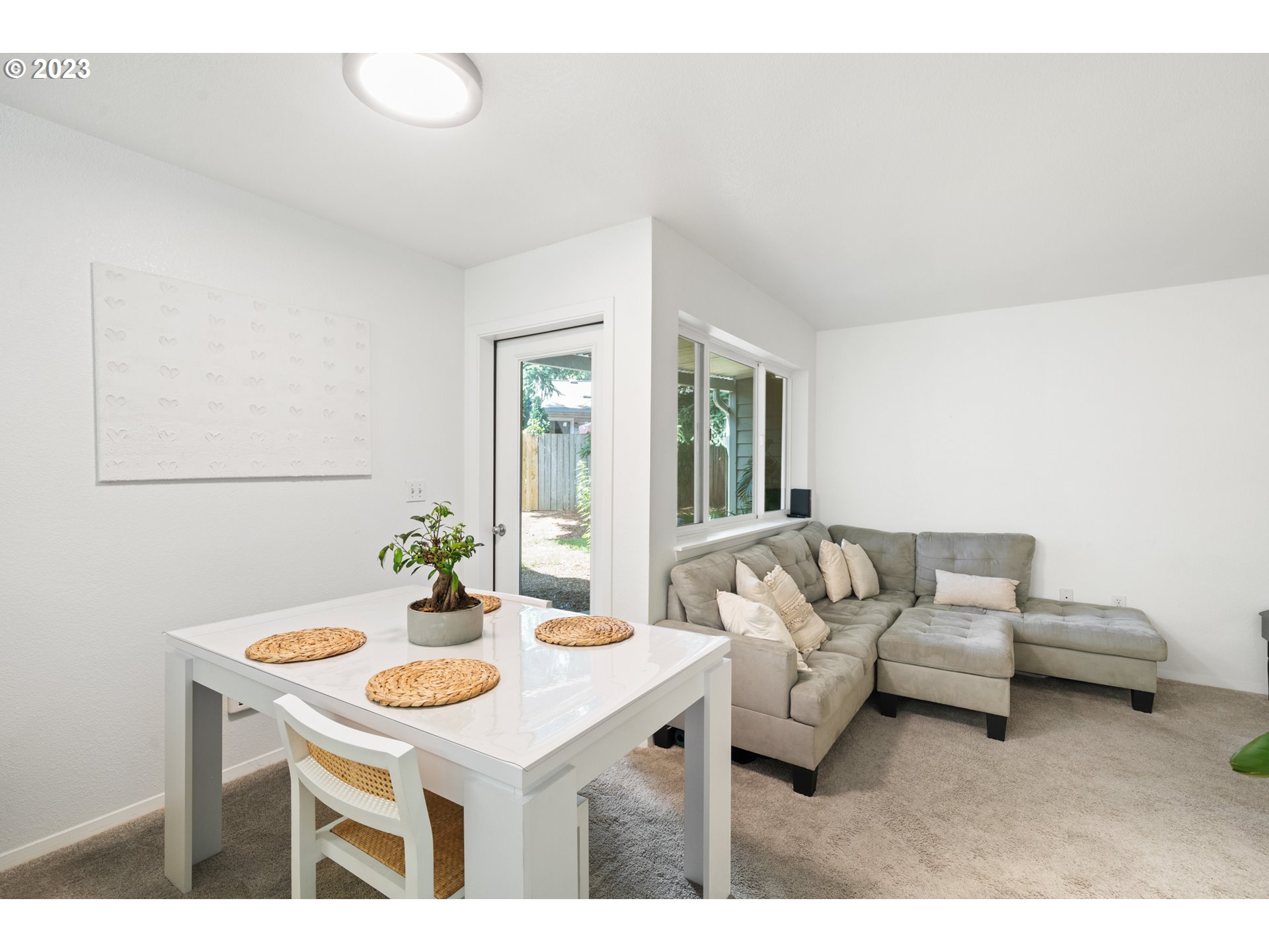 5225 Jean Road, Unit 309 Lake Oswego, OR 97035 - Photo 7 of 26 a living room with furniture and a table