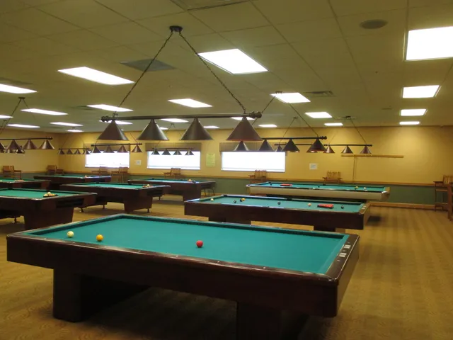 a room with lots of counter space and a wooden floor