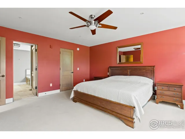 a bathroom with a granite countertop sink mirror toilet and shower