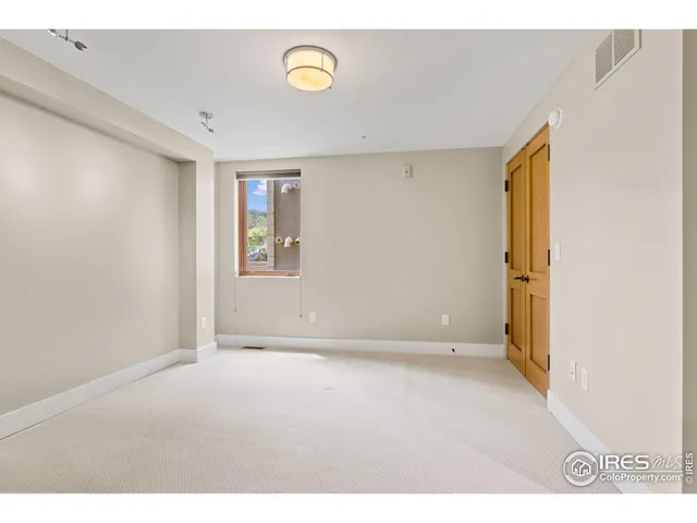 a bathroom with a sink a mirror and a shower