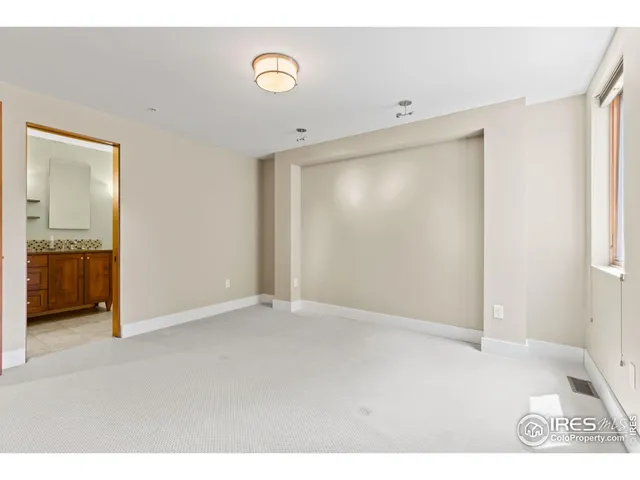 a view of a city with mountains in the background