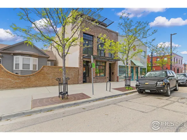 a kitchen with a table and chairs