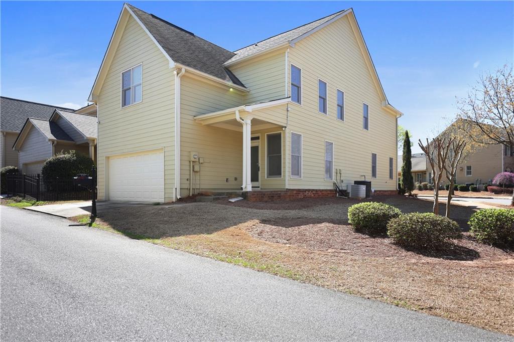 337 Myrtle Trace Lane Suwanee, GA 30024 - Photo 2 of 14 a view of a house with a yard