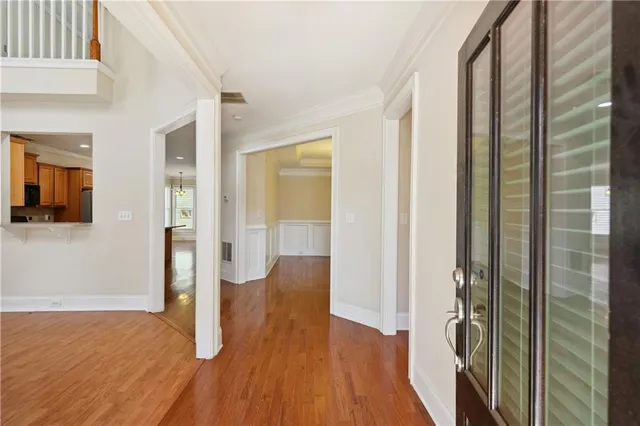 a view of entryway with wooden floor
