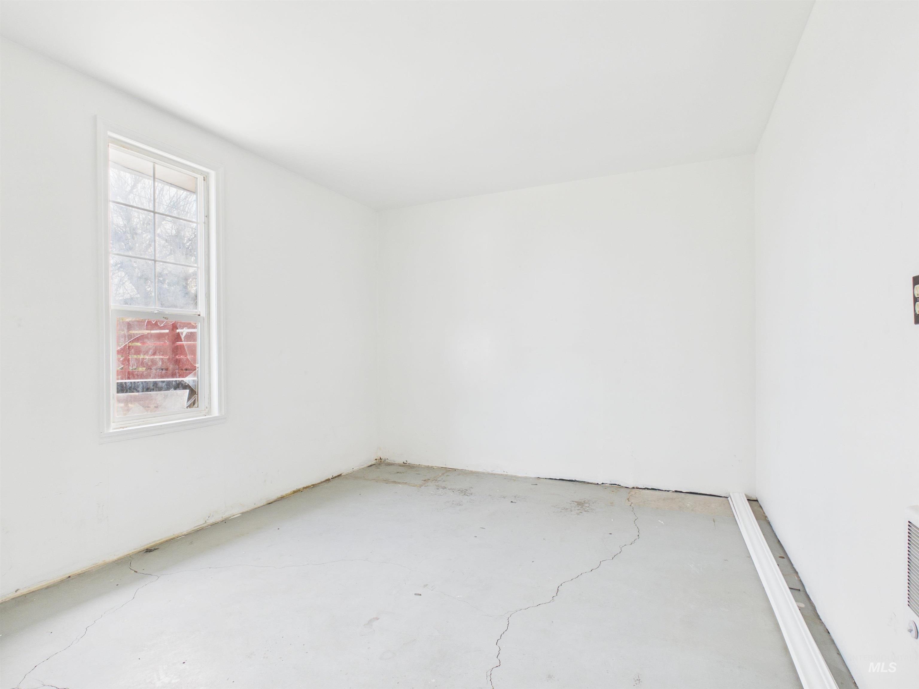 810 South D Street Rupert, ID 83350 - Photo 23 of 23 Unfurnished room featuring unfinished concrete flooring