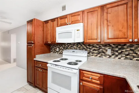 a bathroom with a sink and a washing machine