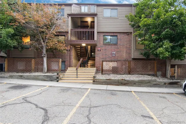 a front view of a house with a garage