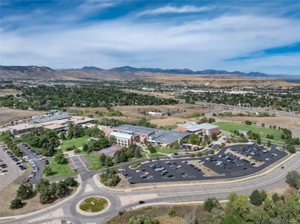 a view of a street with a mountain