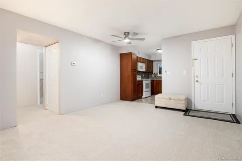 a view of empty room with closet