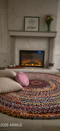 a living room with a fireplace
