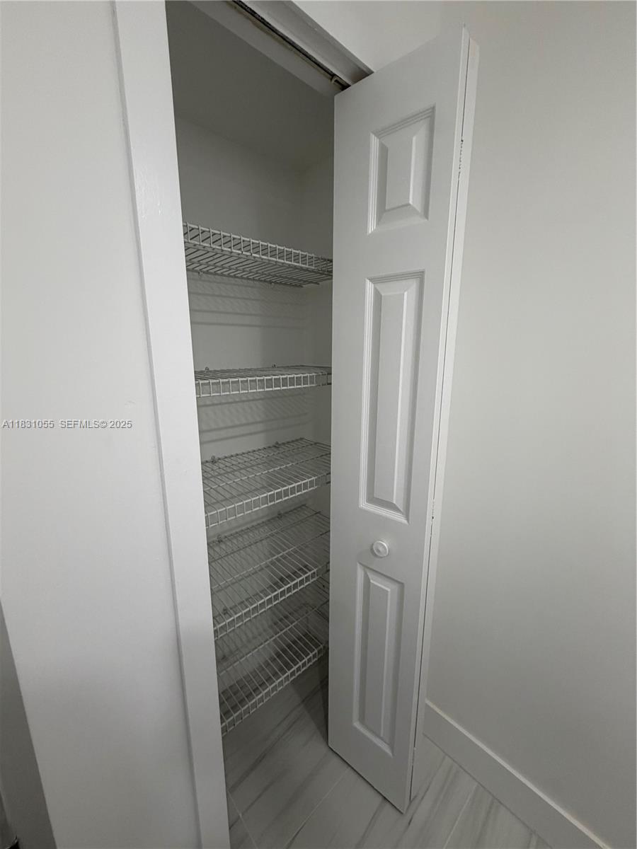 16251 Golf Club Road, Unit 204 Weston, FL 33326 - Photo 17 of 40 a view of walk in closet