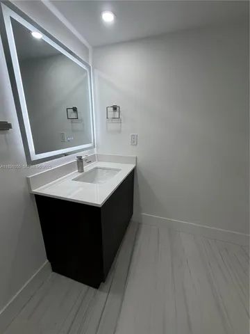 a view of a park with palm trees