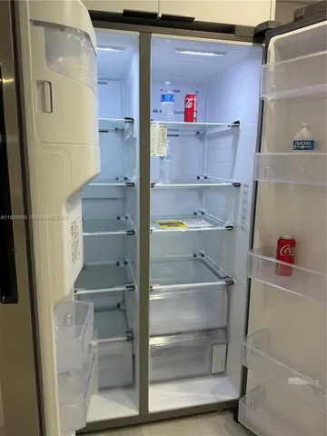 a bathroom with a sink toilet and mirror