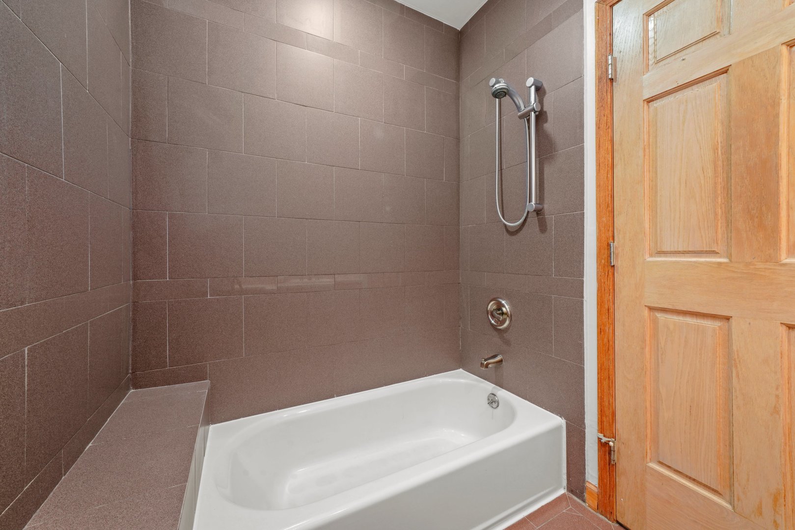 1407 North Mohawk Street, Unit 3 Chicago, IL 60610 - Photo 11 of 19 a bathroom with a tub and shower