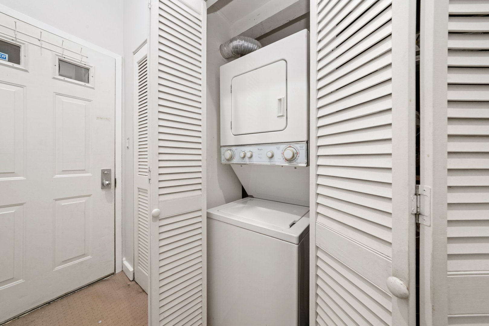1407 North Mohawk Street, Unit 3 Chicago, IL 60610 - Photo 14 of 19 a utility room with dryer and washer