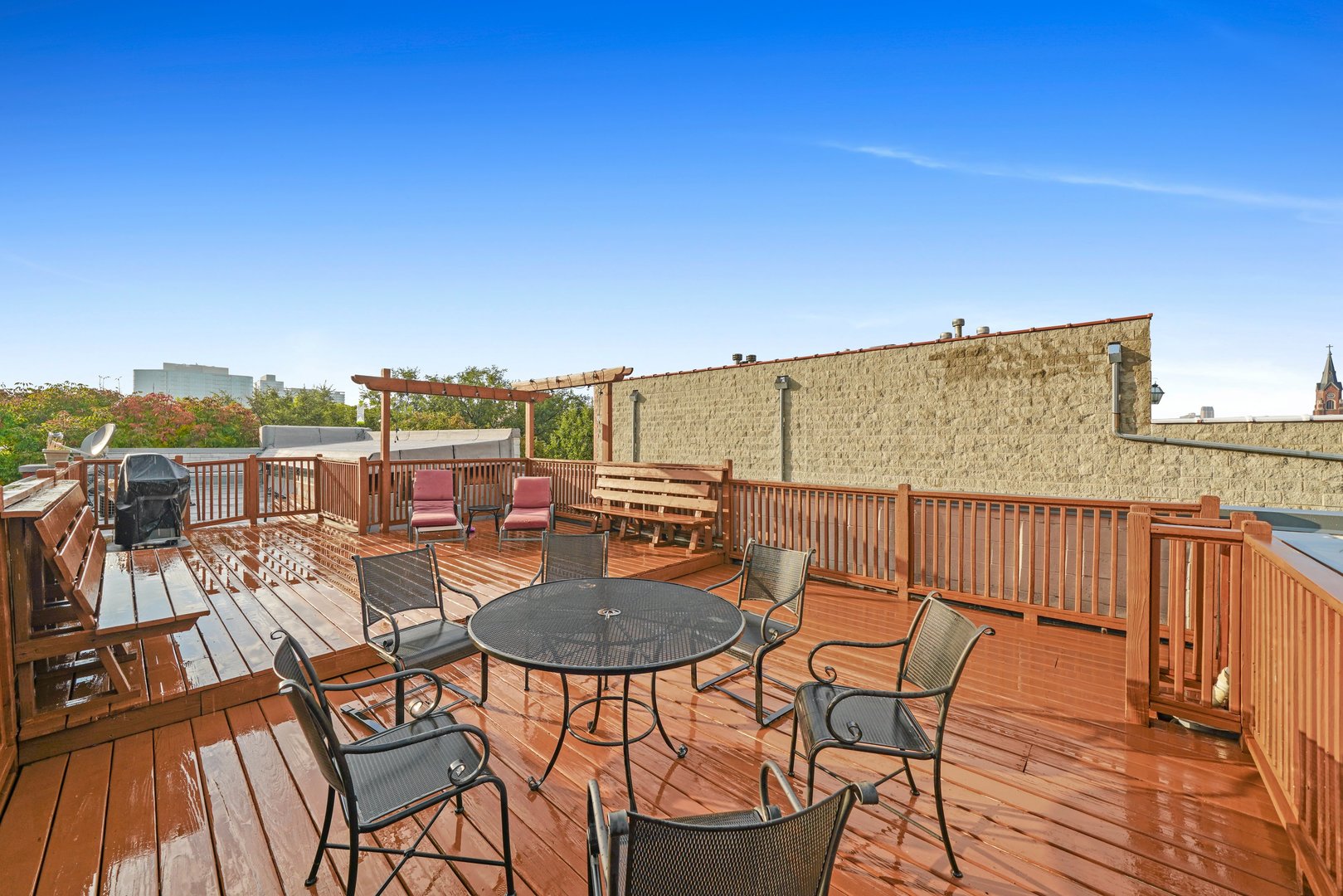 1407 North Mohawk Street, Unit 3 Chicago, IL 60610 - Photo 17 of 19 a view of a balcony with table and chairs