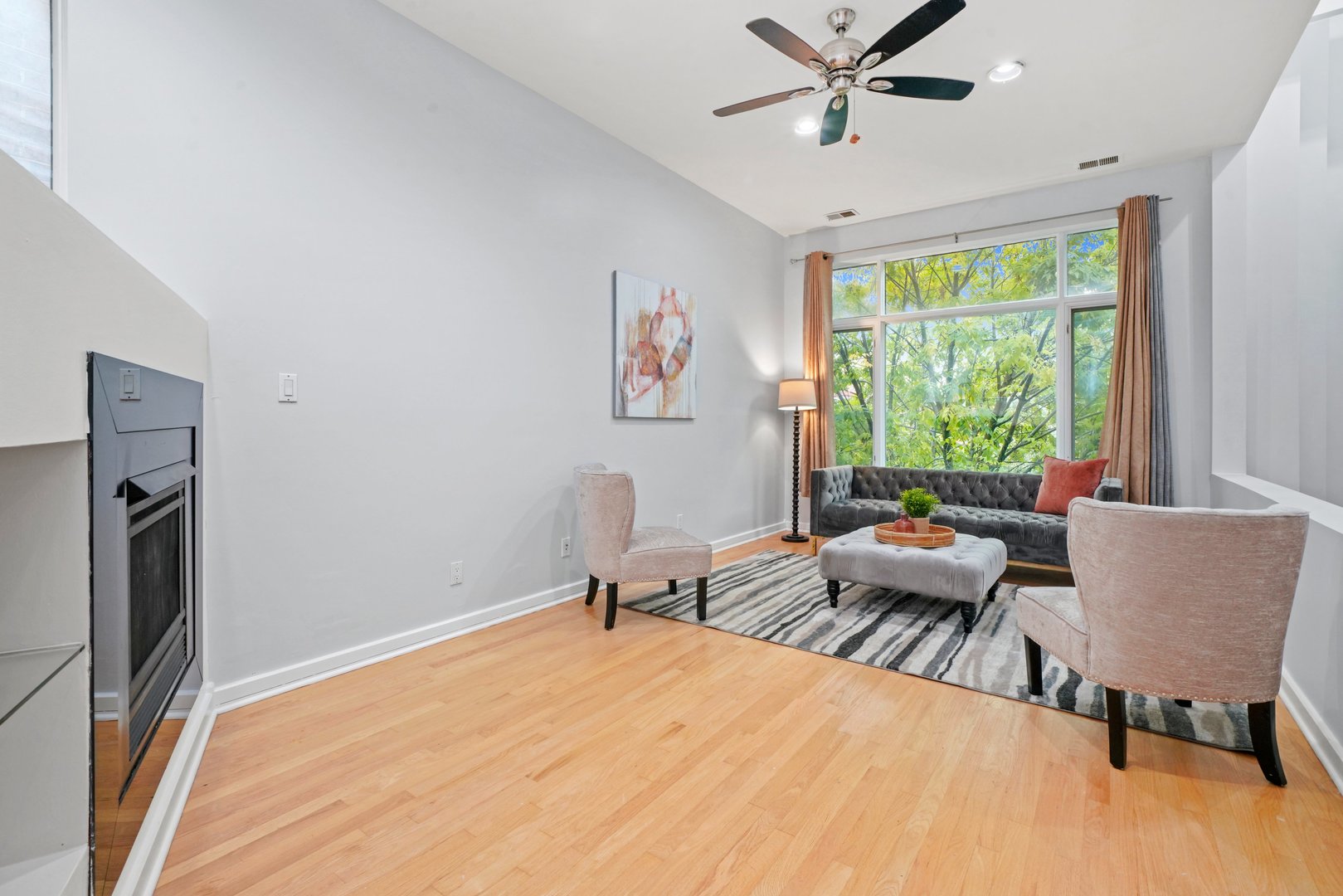 1407 North Mohawk Street, Unit 3 Chicago, IL 60610 - Photo 3 of 19 a bedroom with a bed and a couch