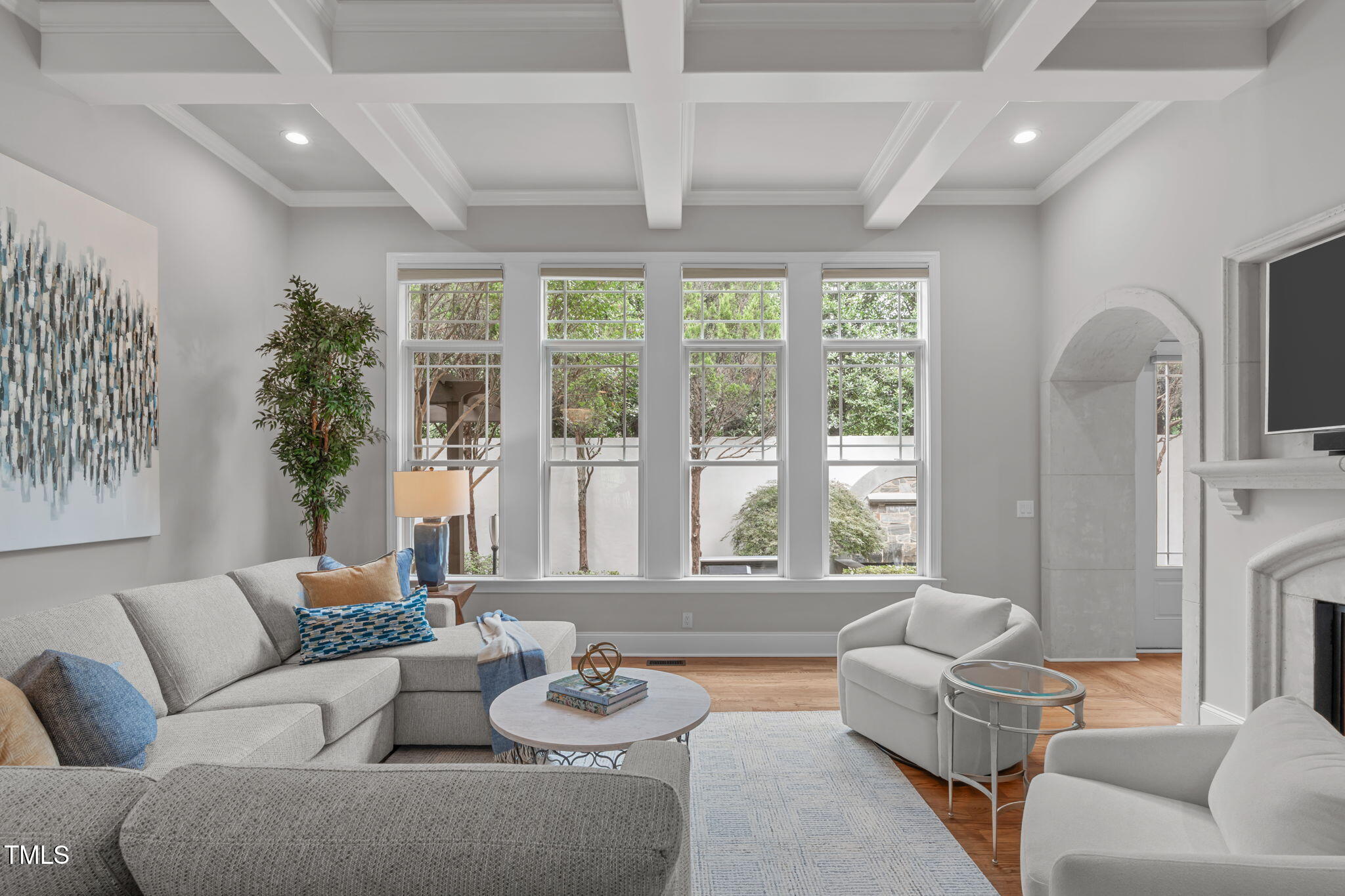 2612 Shadow Hills Court Raleigh, NC 27612 - Photo 15 of 63 a living room with furniture fireplace and a large window