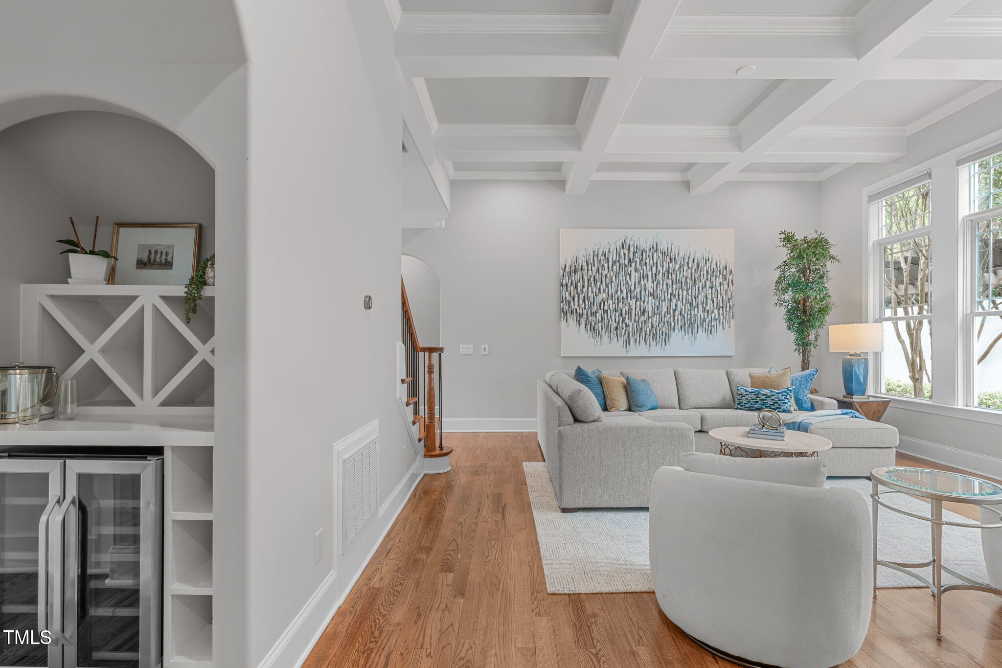 2612 Shadow Hills Court Raleigh, NC 27612 - Photo 17 of 63 a living room with furniture a table and a potted plant