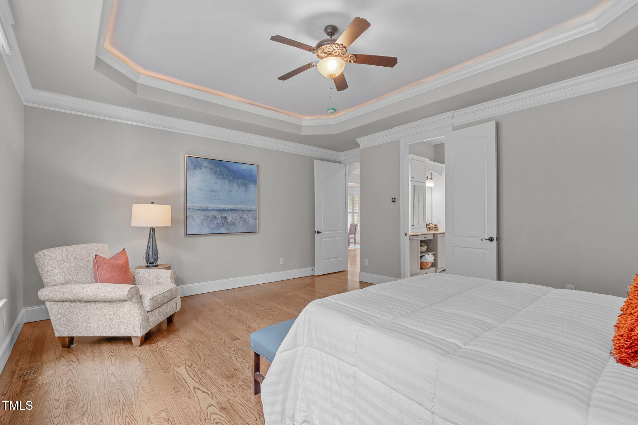 2612 Shadow Hills Court Raleigh, NC 27612 - Photo 29 of 63 a bedroom with a bed and a couch