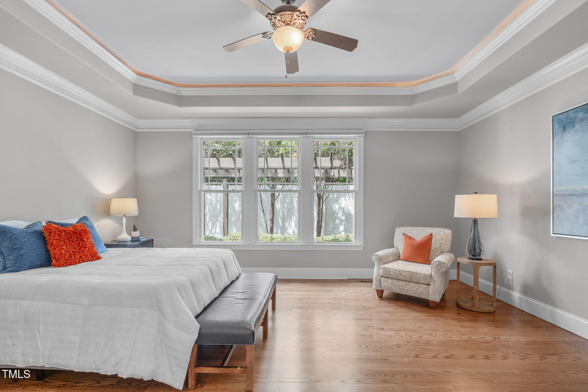 2612 Shadow Hills Court Raleigh, NC 27612 - Photo 31 of 63 a bedroom with a bed and a large window