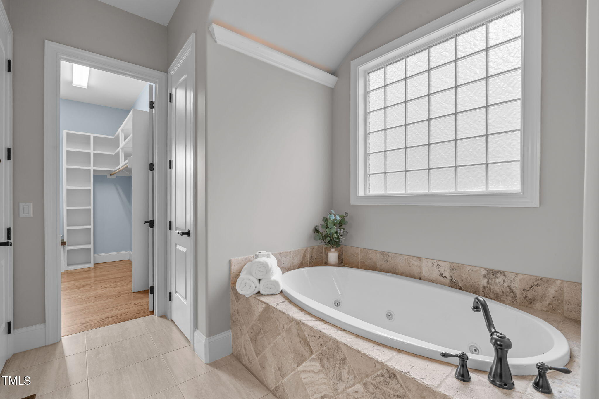 2612 Shadow Hills Court Raleigh, NC 27612 - Photo 33 of 63 a bathroom with a tub and shower