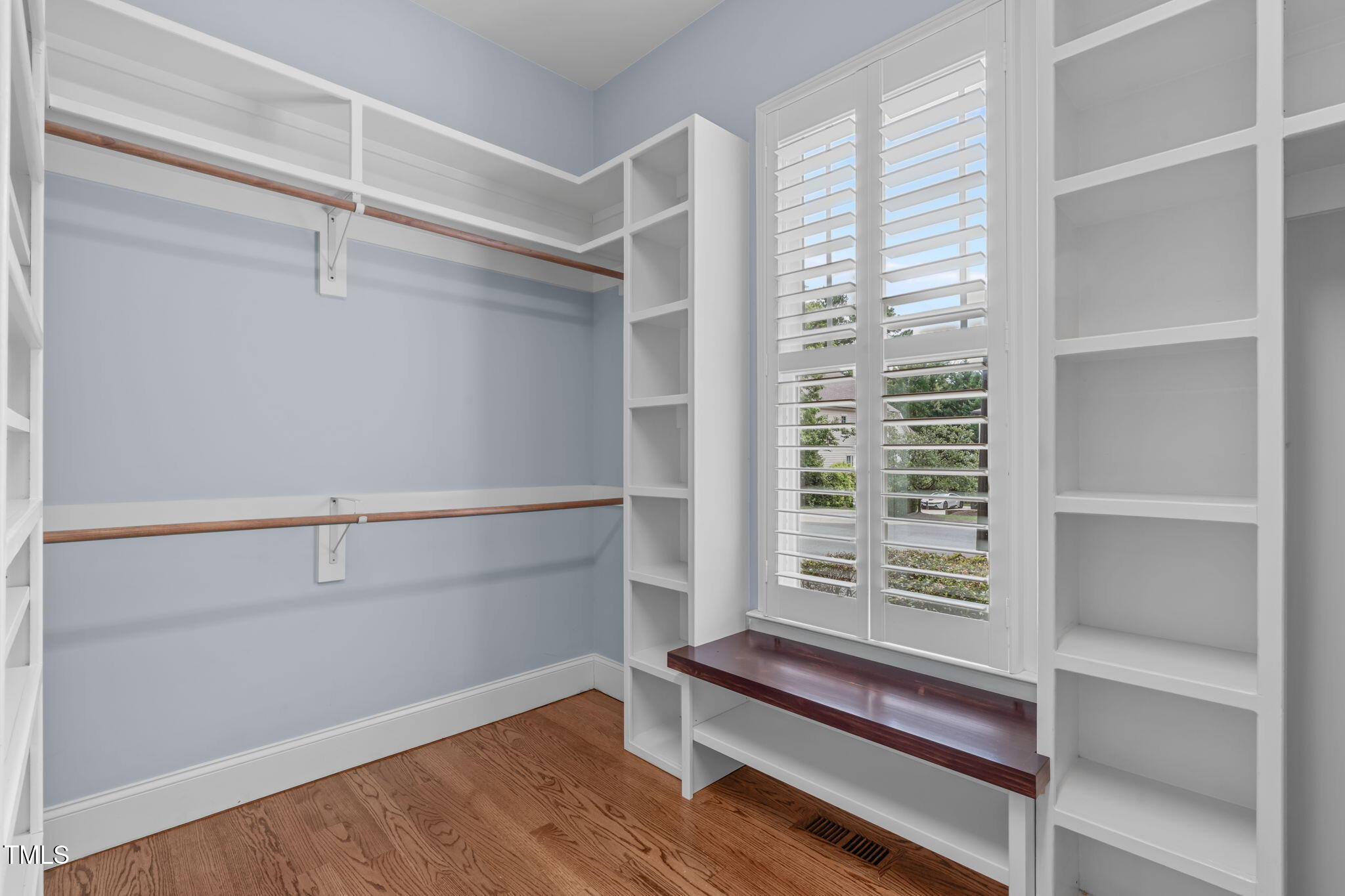 2612 Shadow Hills Court Raleigh, NC 27612 - Photo 36 of 63 a view of walk in closet with empty racks