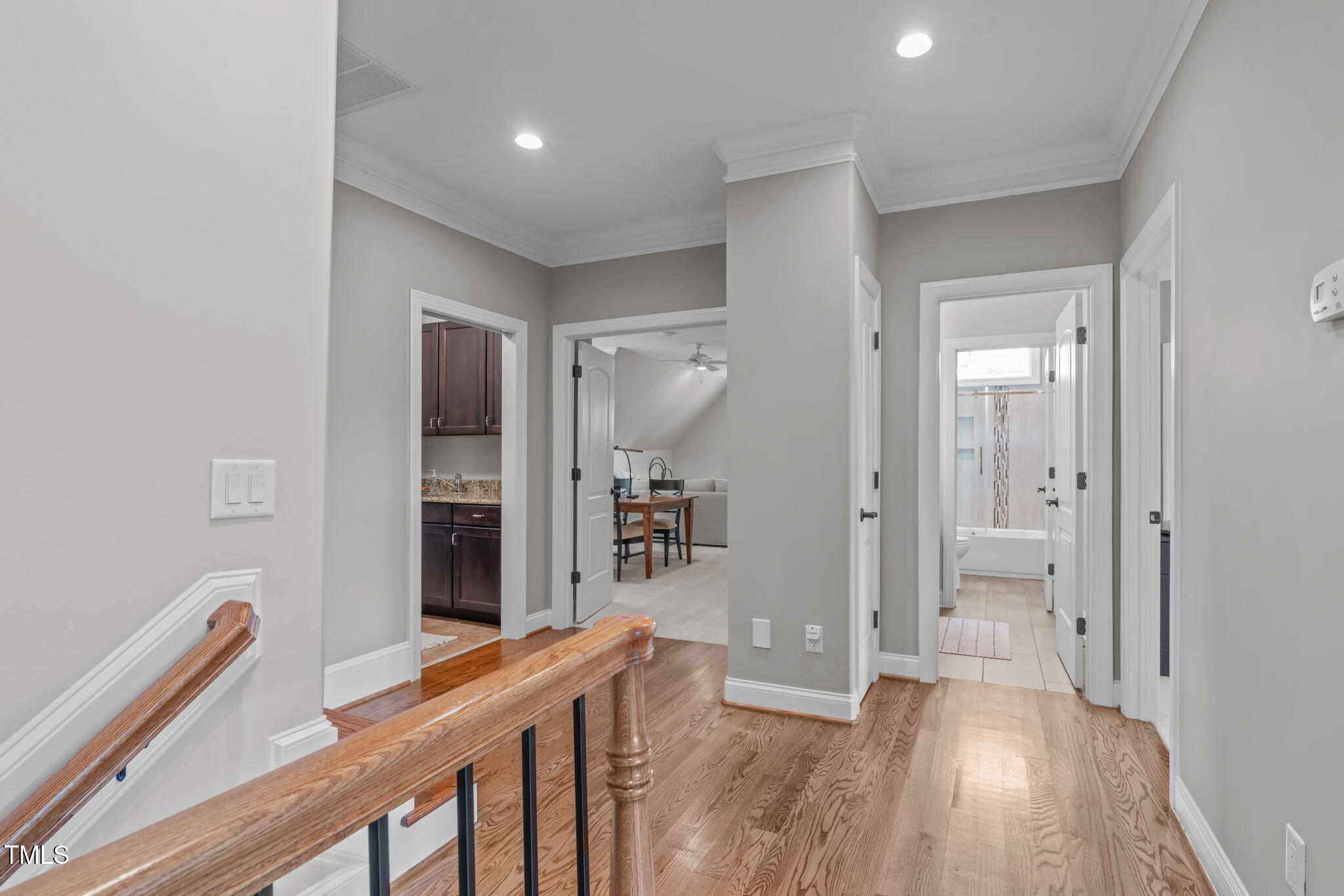 2612 Shadow Hills Court Raleigh, NC 27612 - Photo 38 of 63 a view of hallway with wooden floor