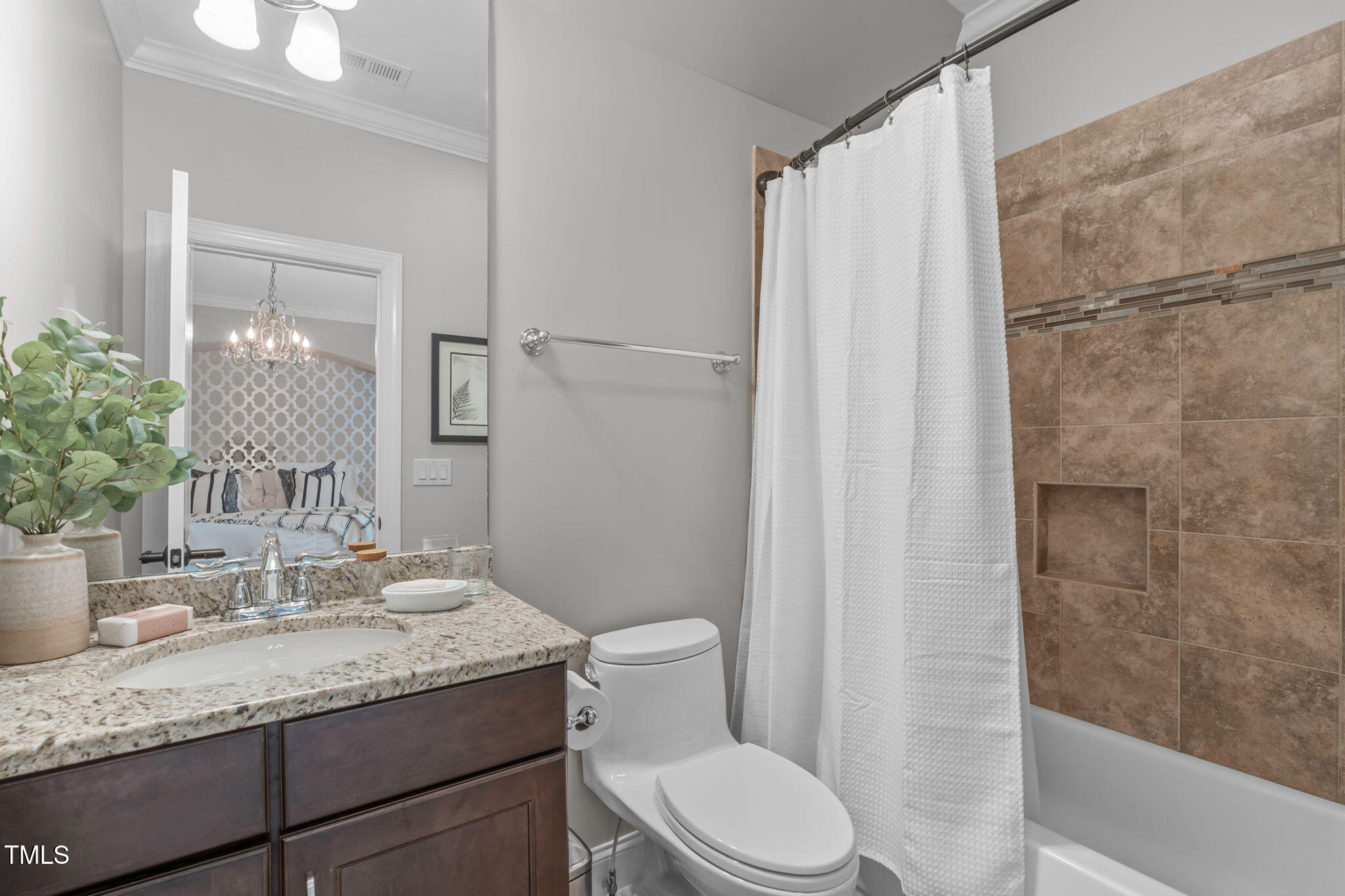 2612 Shadow Hills Court Raleigh, NC 27612 - Photo 52 of 63 a bathroom with a granite countertop sink toilet and shower