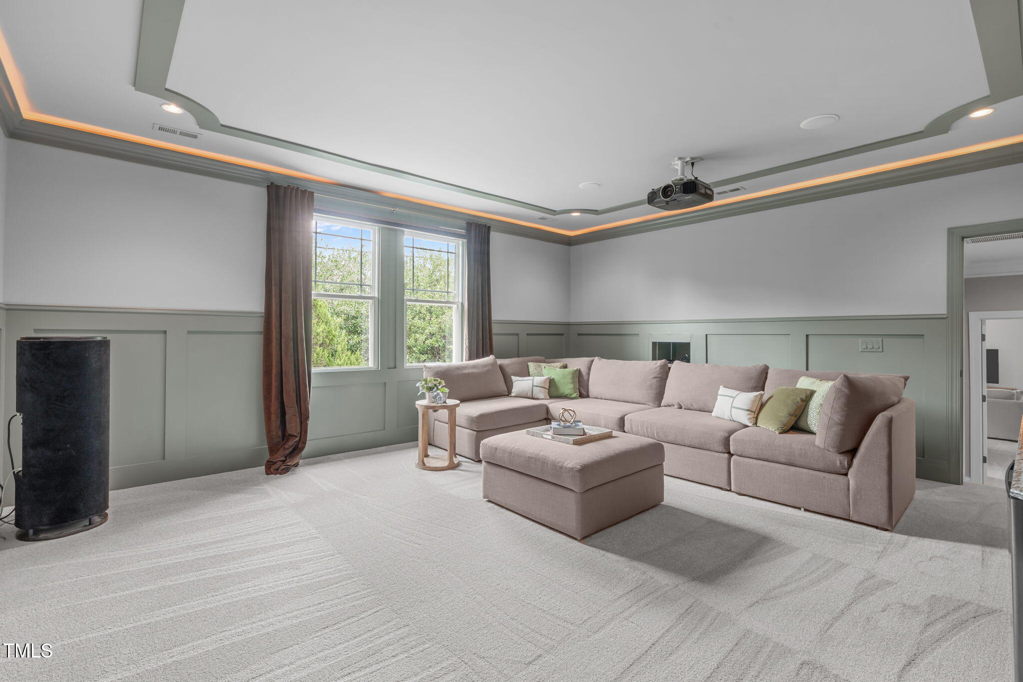 2612 Shadow Hills Court Raleigh, NC 27612 - Photo 54 of 63 a living room with furniture and a large window