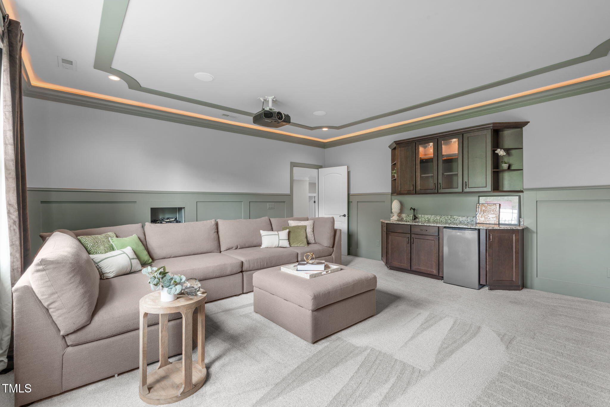 2612 Shadow Hills Court Raleigh, NC 27612 - Photo 55 of 63 a living room with furniture and kitchen view