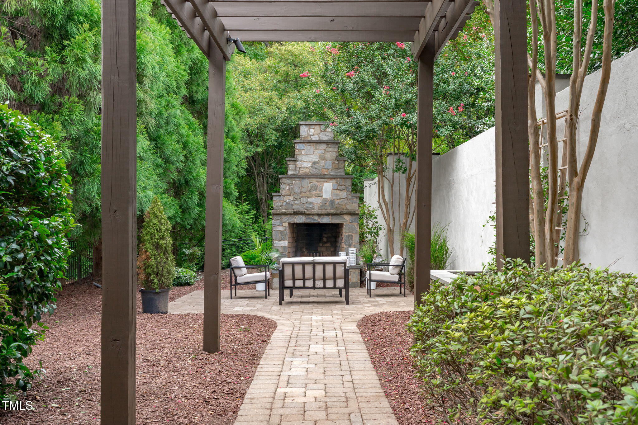 2612 Shadow Hills Court Raleigh, NC 27612 - Photo 60 of 63 a front view of a house with garden