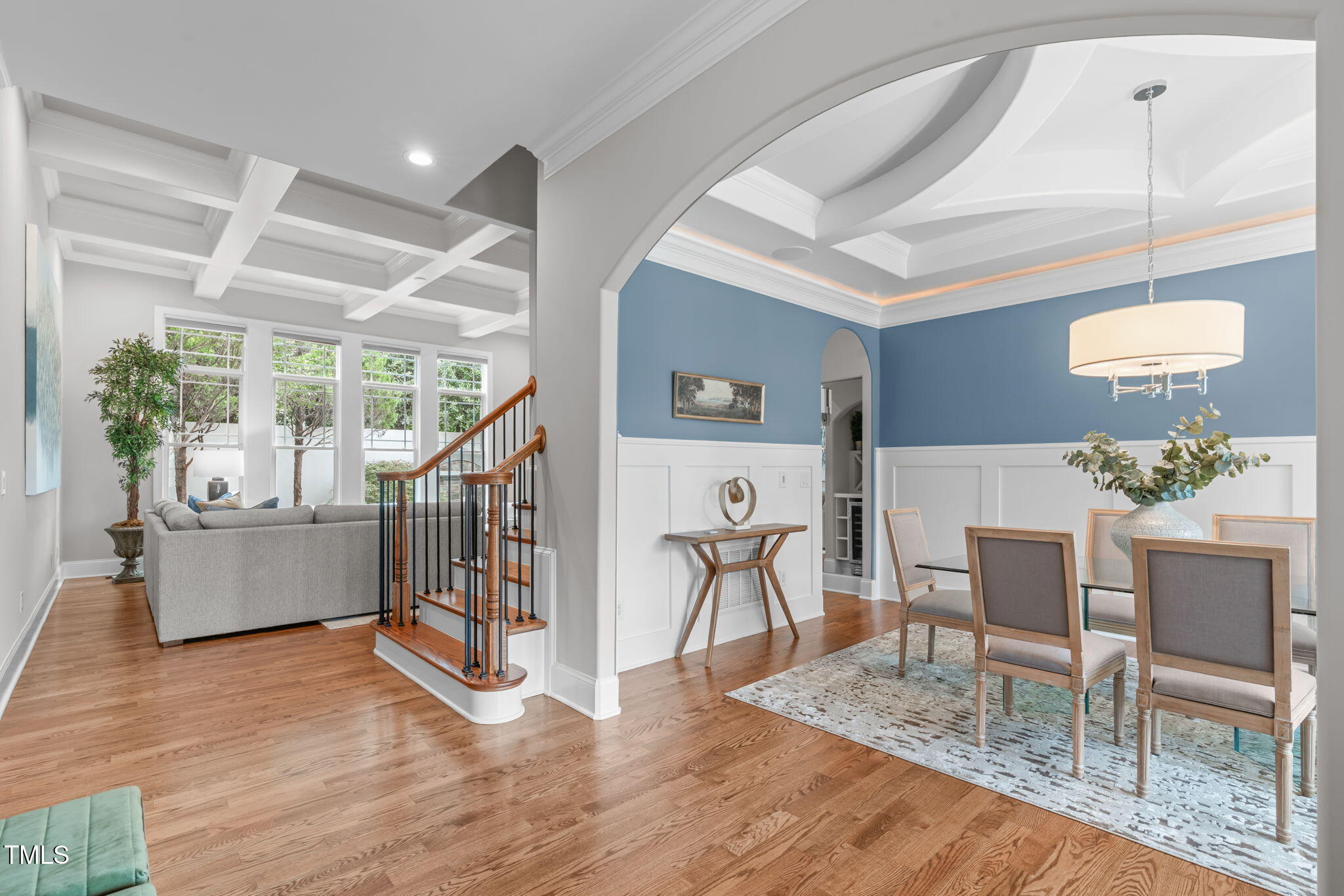 2612 Shadow Hills Court Raleigh, NC 27612 - Photo 6 of 63 a living room with furniture and a wooden floor