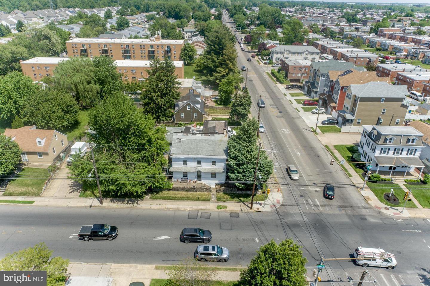 8000 Algon Avenue Philadelphia, PA 19152 - Photo 8 of 15 Urban landscape with greenery and traffic flow.