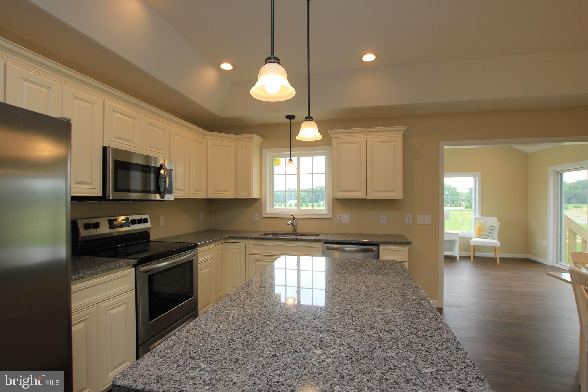 16303 Adams Road Laurel, DE 19956 - Photo 7 of 23 Kitchen with granite Island*Photo of similar model